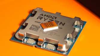 Close-up of an AMD Ryzen CPU on a yellow background
