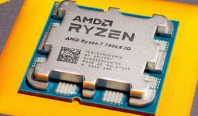 Close-up of an AMD Ryzen CPU on a yellow background