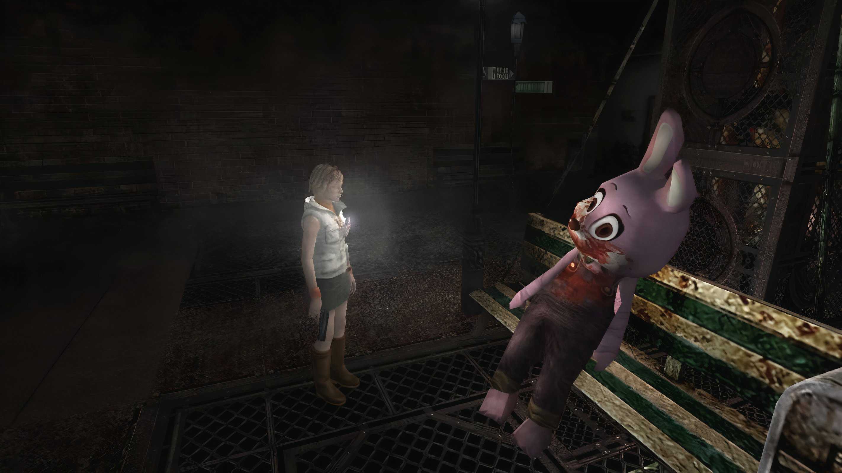 A screenshot from the 2012 game "Silent Hill HD Collection", showing Heather Mason shining a flashlight at a huge pink bunny outfit seated on a rusted bench.