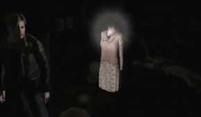 A screenshot from the 2012 game "Silent Hill HD Collection", showing James Sunderland standing next to a headless mannequin.