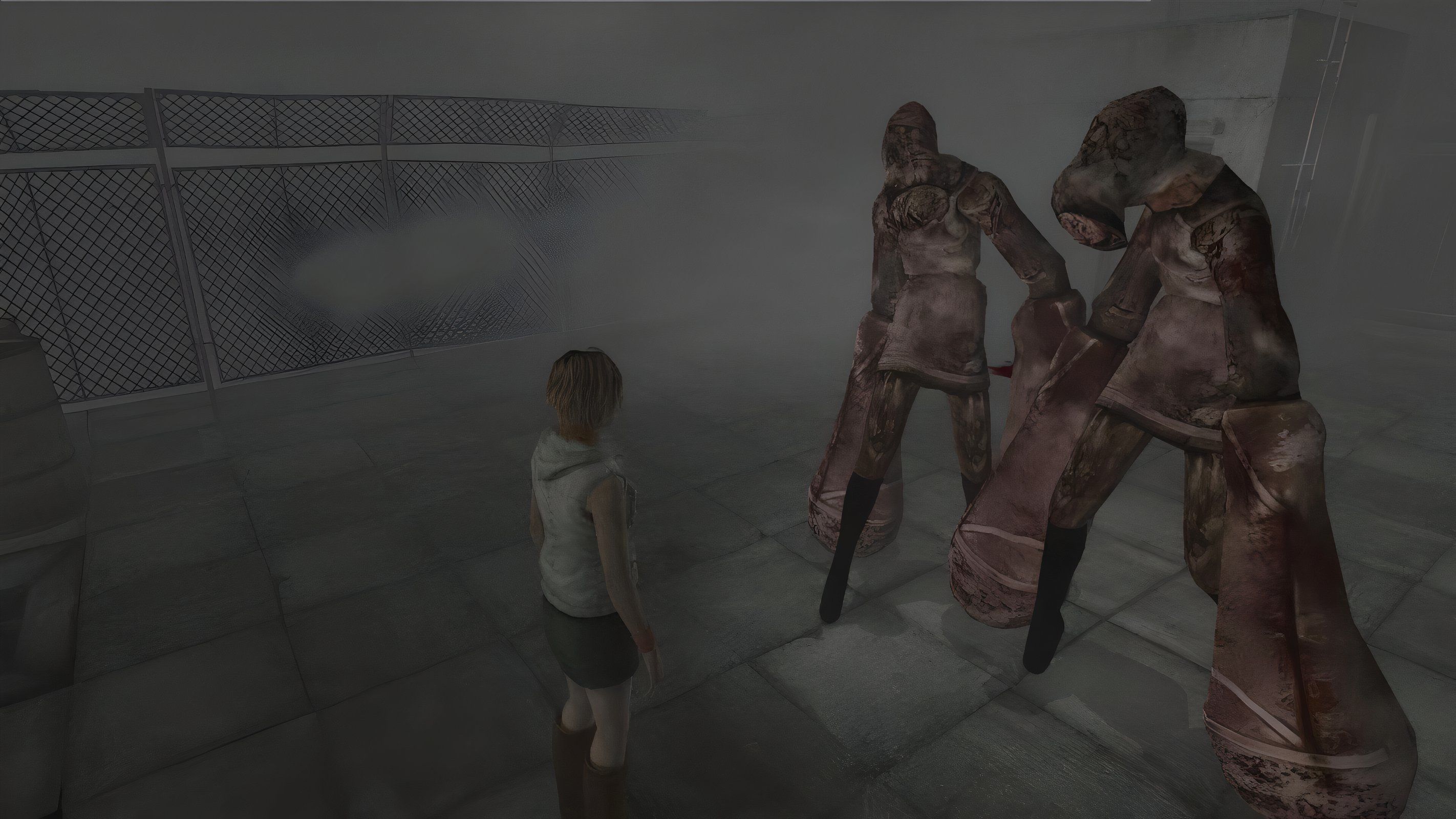 A screenshot from the 2012 game "Silent Hill HD Collection", showing Heather Mason facing two monsters.
