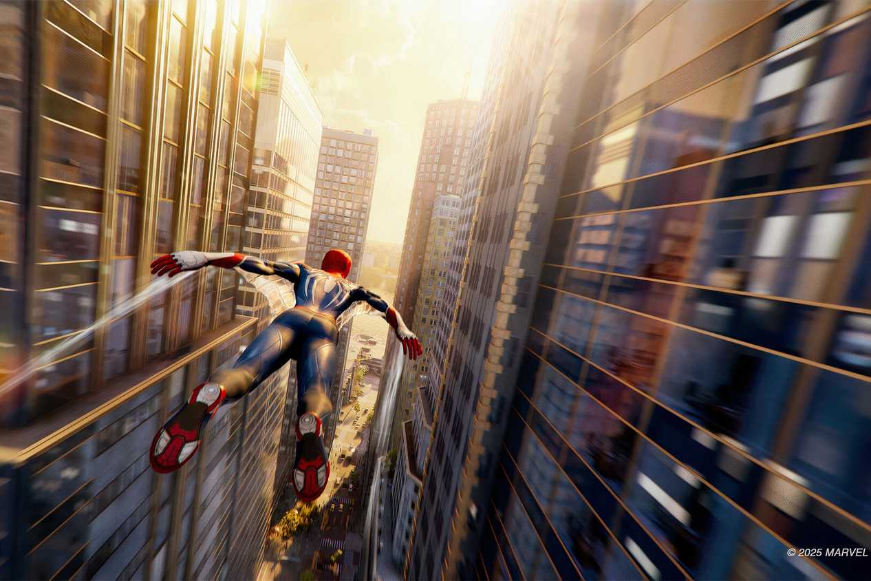 An image from Insomniac's Spider-Man 2, showing Peter Parker as Spider-Man gliding through the city.