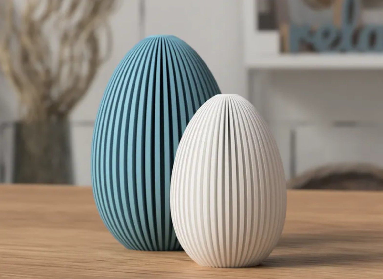 Two 3D printed eater bunny with different colors and no ears