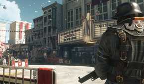 Soldier stands watch over a sunny parade.