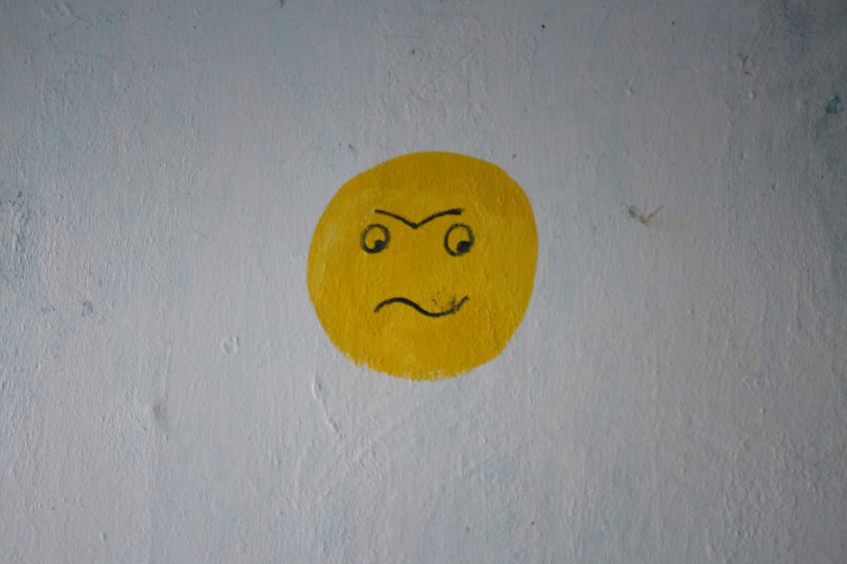 worried face on wall