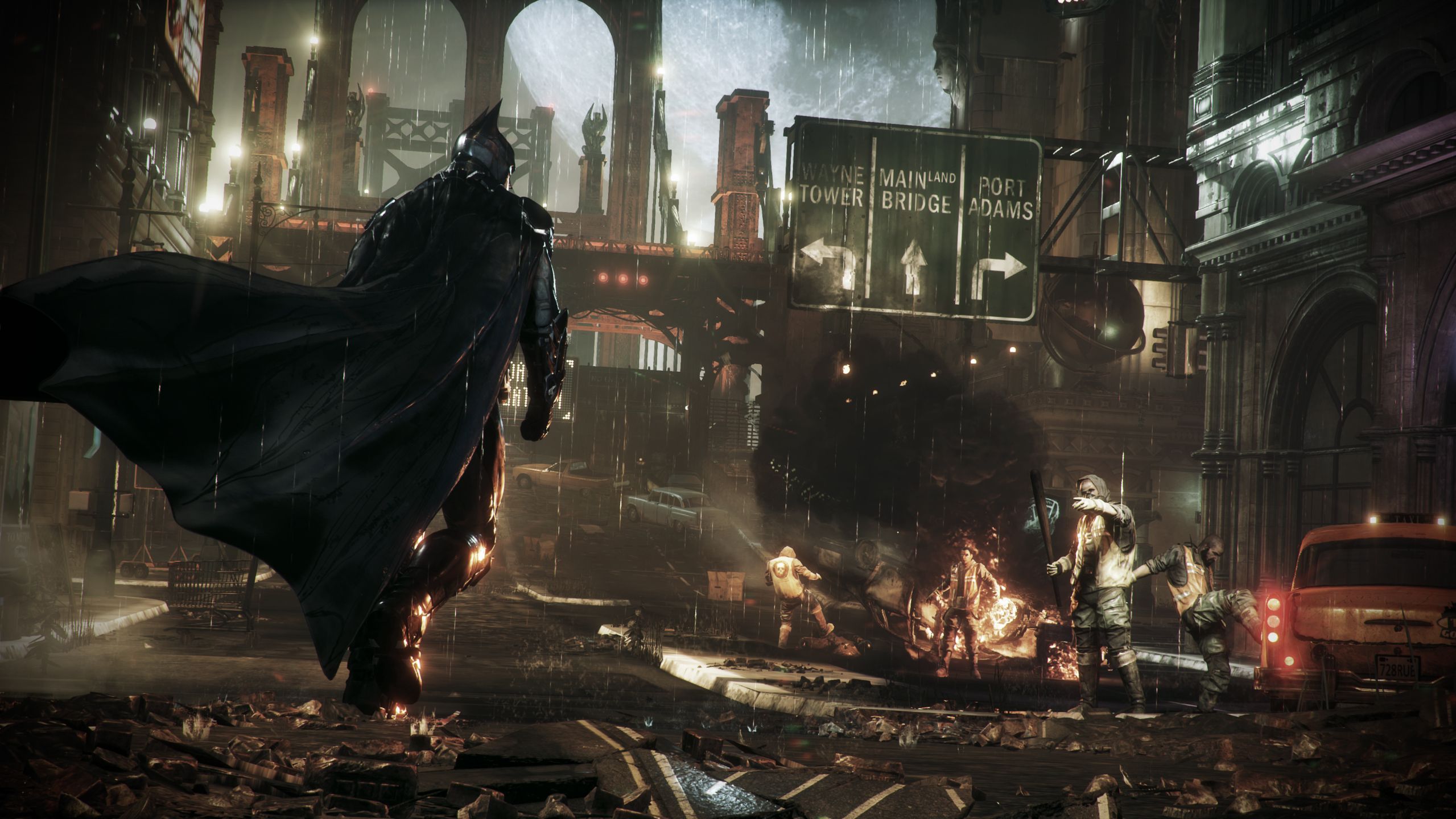 Batman walking up to goons in Batman: Arkham Knight.