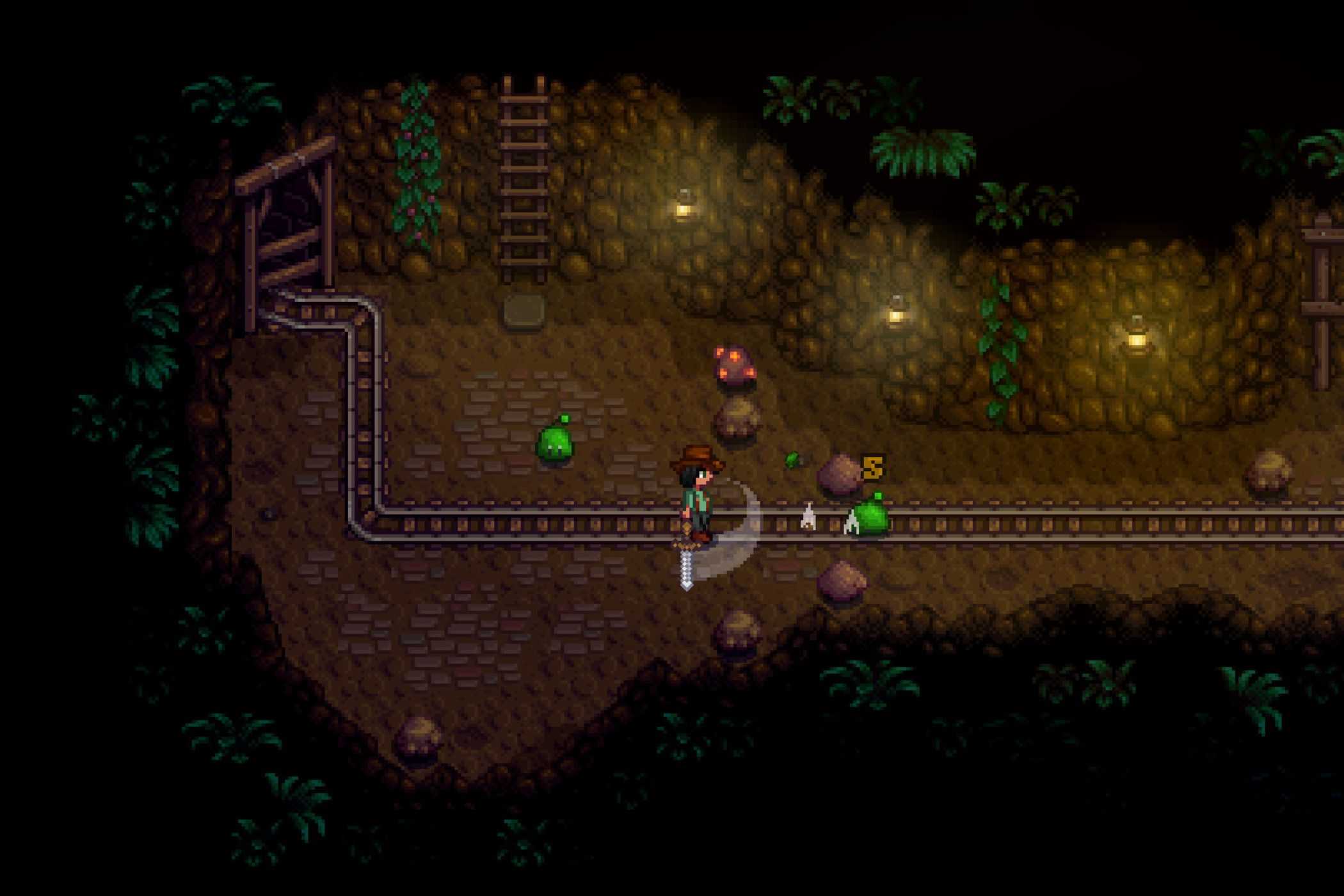 Stardew Valley player slashing sword in dungeon