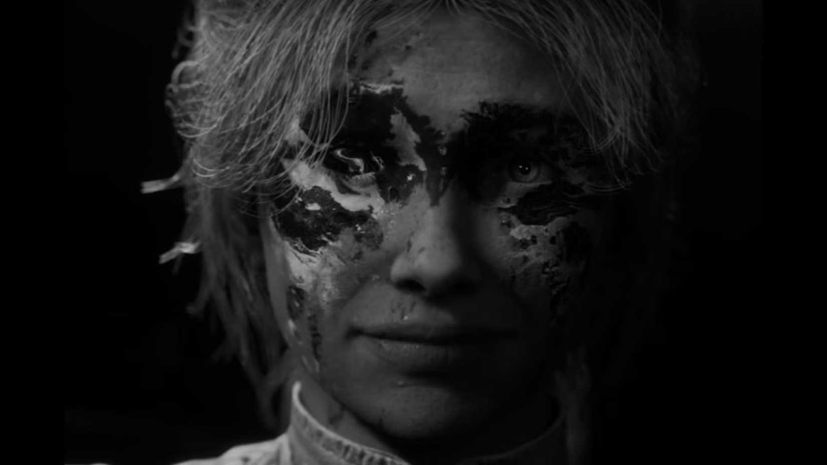 clair obscur maelle's ending, showing her face with paint on it
