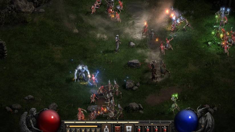 Diablo 2 resurrected wizard fighting in a field