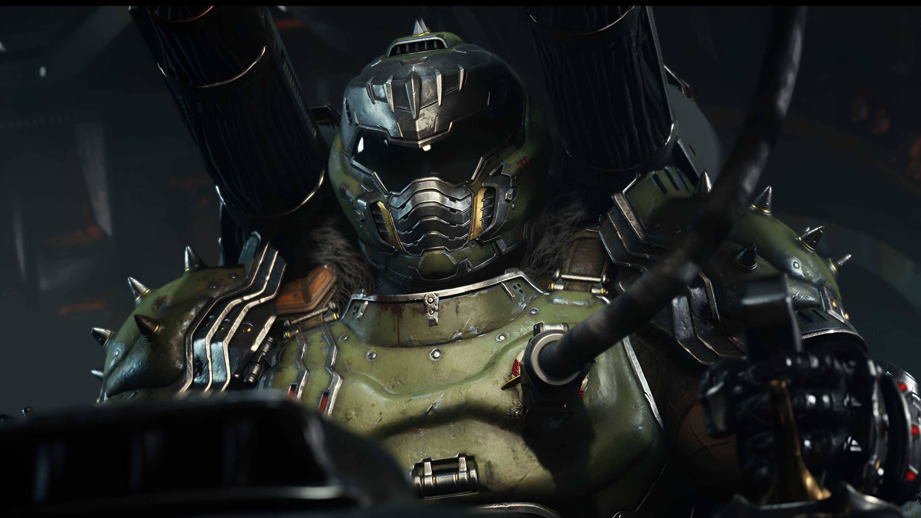 A screenshot from Doom: The Dark Ages, showing the Doom Slayer plugged into the Atlan Mech.