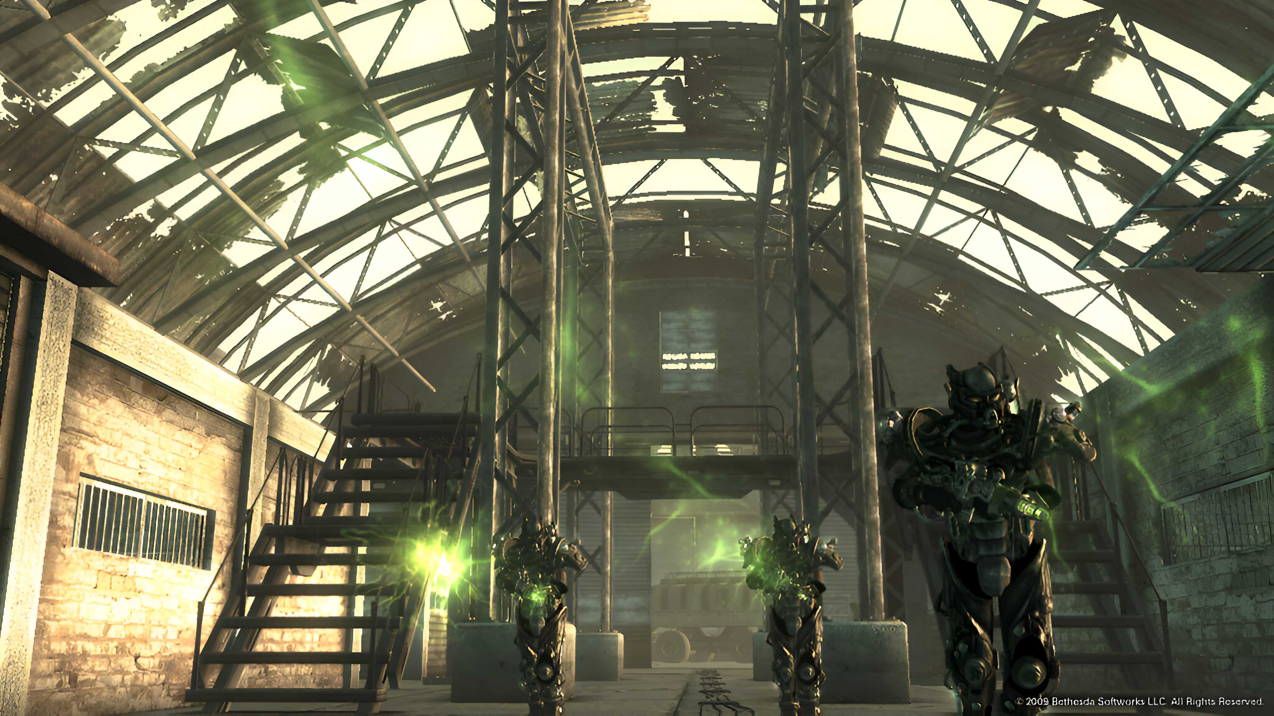 Three characters wearing power armor in Fallout 3.