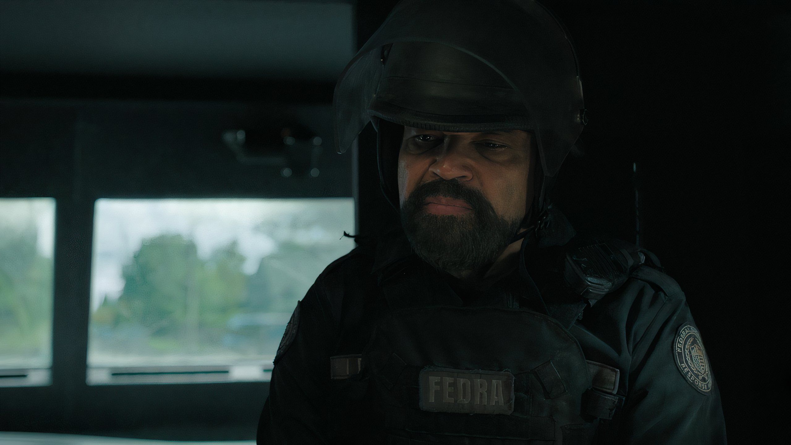 A screengrab from episode 4 of the HBO show The Last of Us Season 2, showing actor Jeffrey Wright as Isaac Dixon, wearing a military uniform.