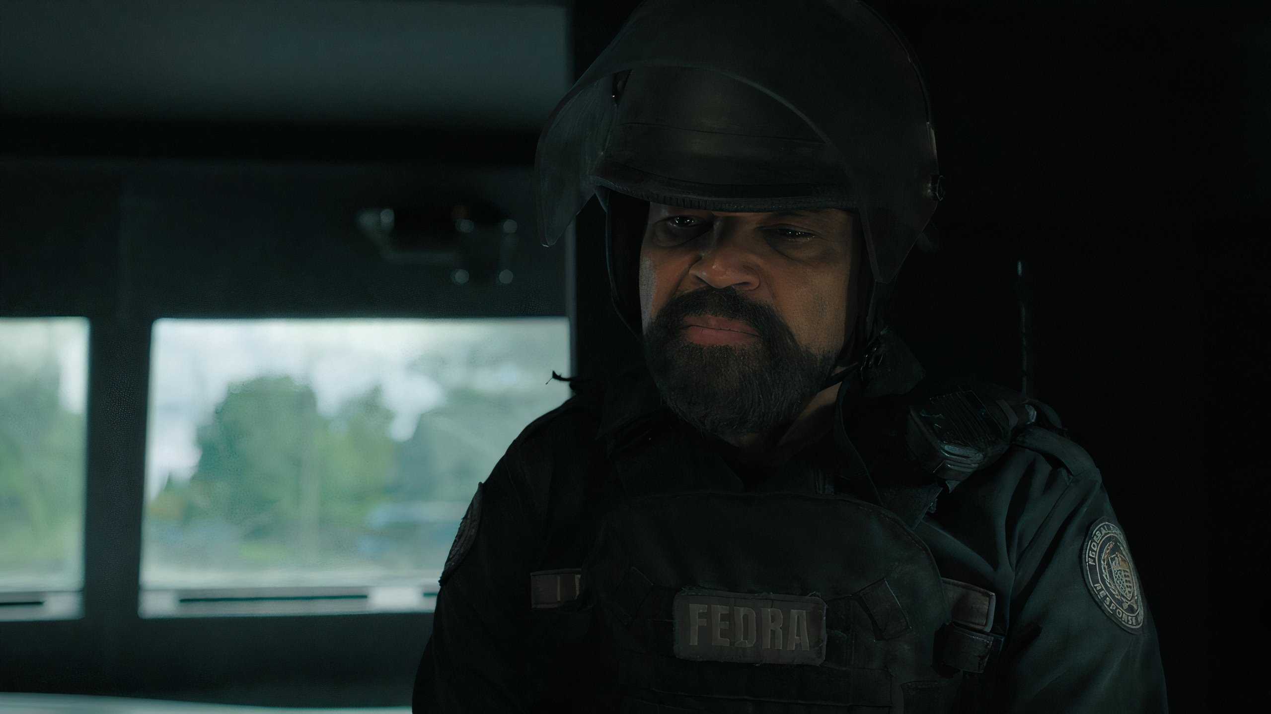 A screengrab from episode 4 of the HBO show The Last of Us Season 2, showing actor Jeffrey Wright as Isaac Dixon, wearing a military uniform.