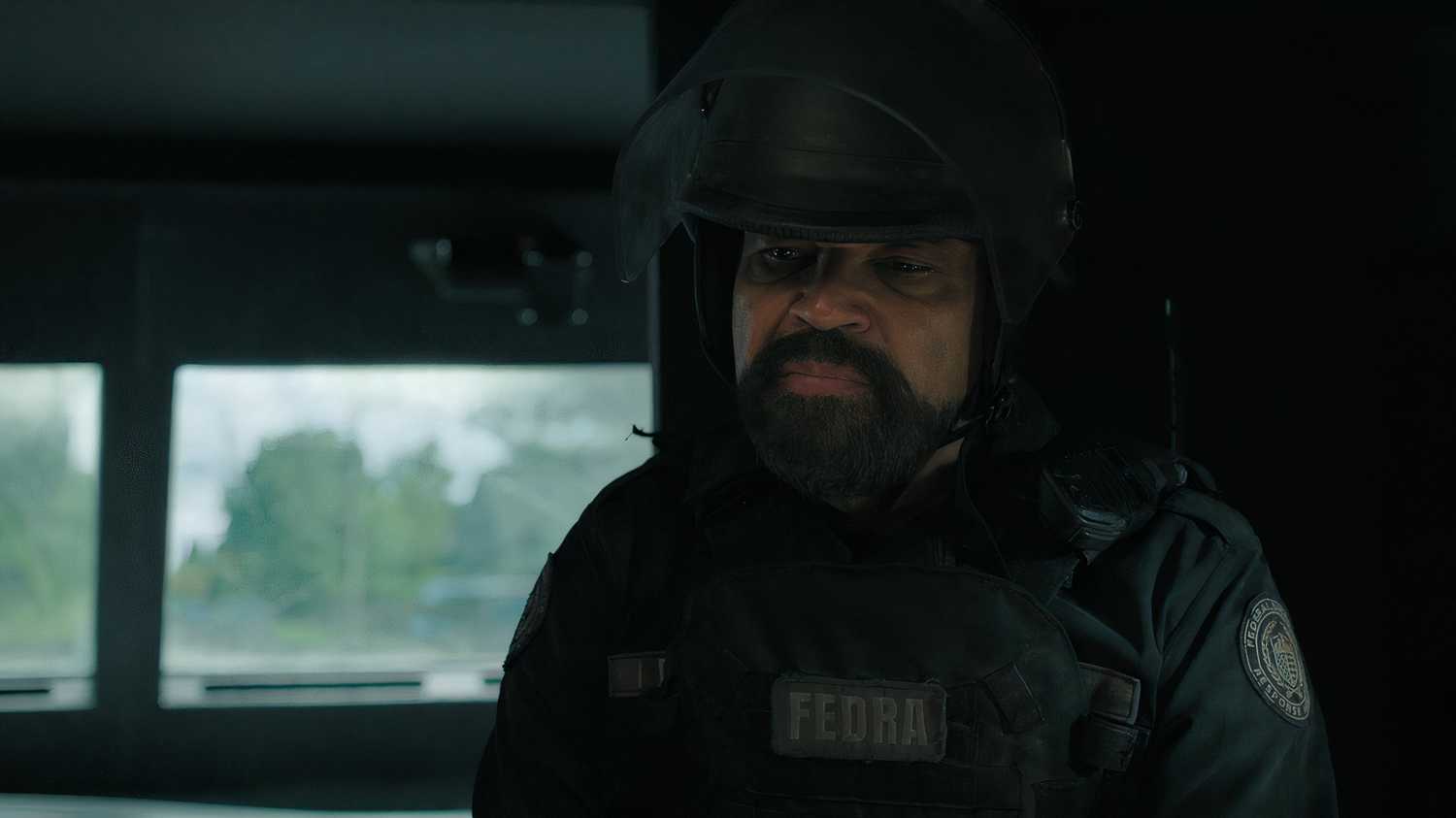 A screengrab from episode 4 of the HBO show The Last of Us Season 2, showing actor Jeffrey Wright as Isaac Dixon, wearing a military uniform.