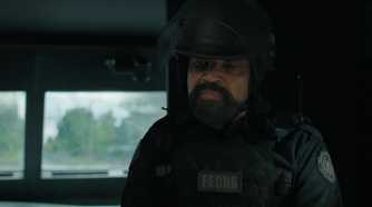 A screengrab from episode 4 of the HBO show The Last of Us Season 2, showing actor Jeffrey Wright as Isaac Dixon, wearing a military uniform.