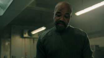 A screengrab from episode 4 of the HBO show The Last of Us Season 2, showing Isaac Dixon in a kitchen.