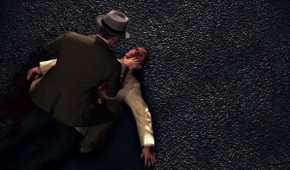 Cole Phelps leaning over another man's corpse in L.A. Noire.