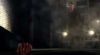 Cole Phelps standing in front of a car with its headlights on in L.A. Noire.