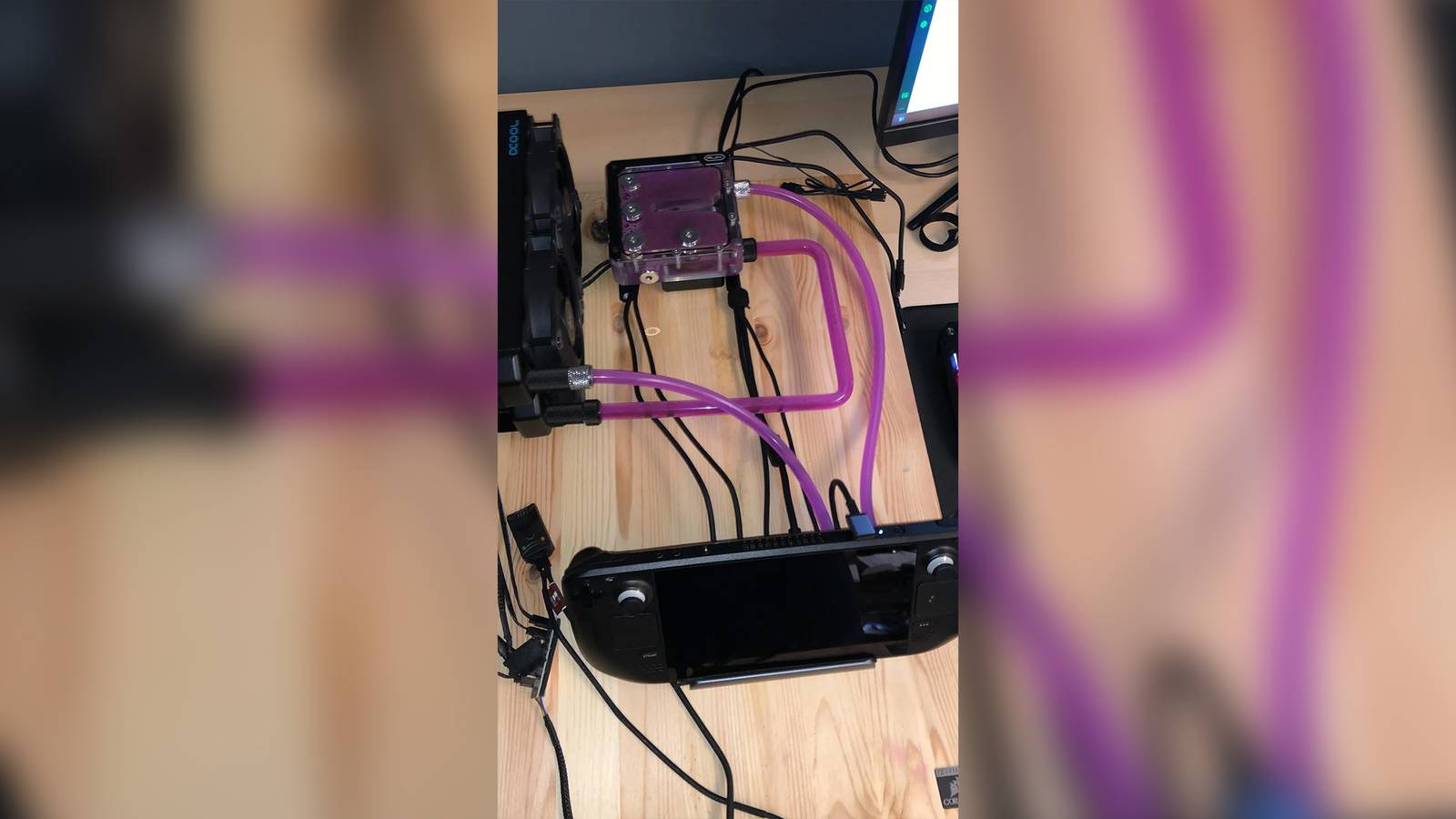Someone built a custom liquid cooling loop for their Steam Deck because ...