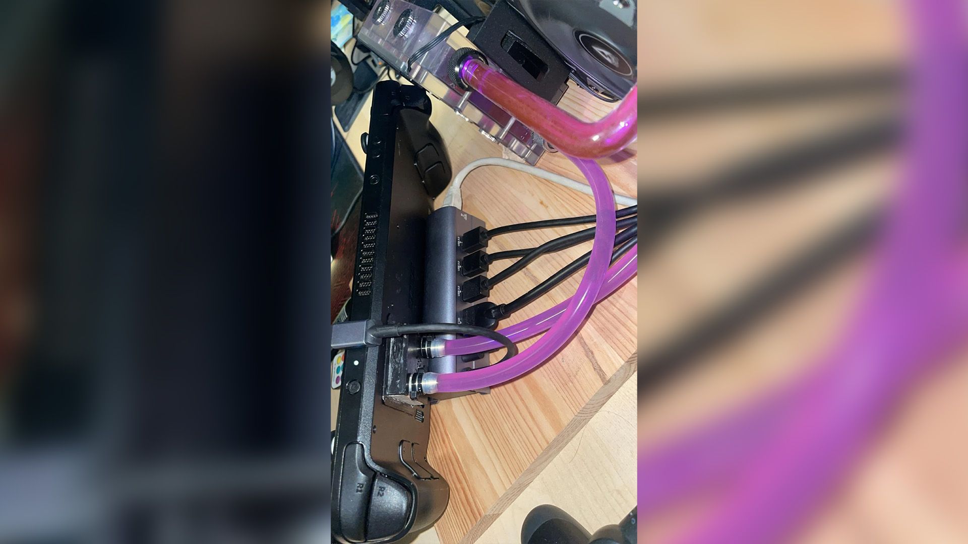 Someone built a custom liquid cooling loop for their Steam Deck because ...