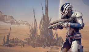 A character holding a gun in a desert landscape in Mass Effect: Andromeda.