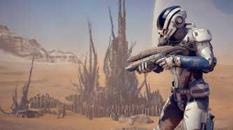 A character holding a gun in a desert landscape in Mass Effect: Andromeda.