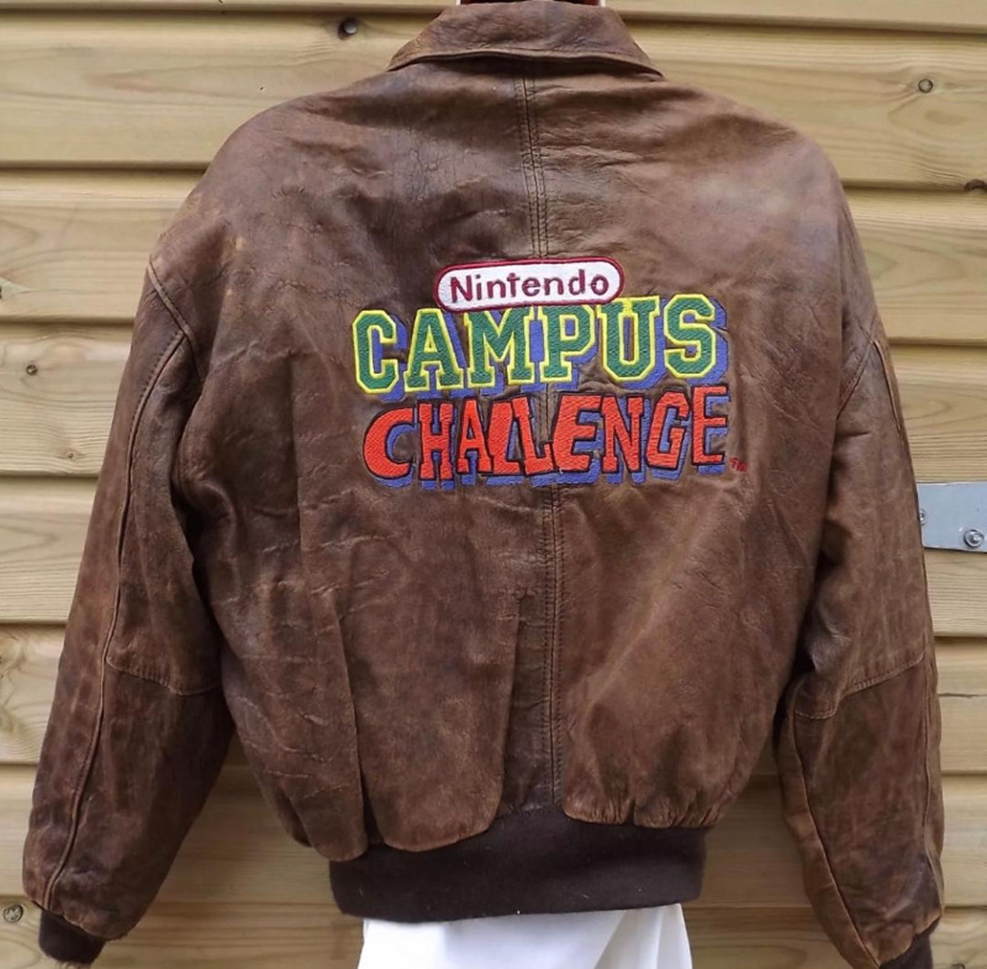 A picture of a jacket worn by staff at the Nintendo Campus Challenge.