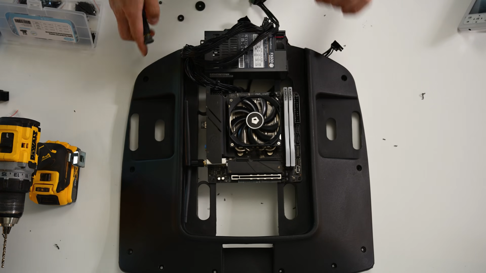 Someone hid a desktop PC in the seat of their chair, and surprisingly ...