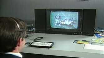 A shot of someone playing NFL Football on the RDI Halcyon console.