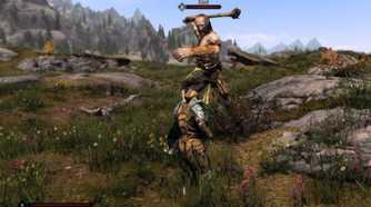 Skyrim player fighting giant in field