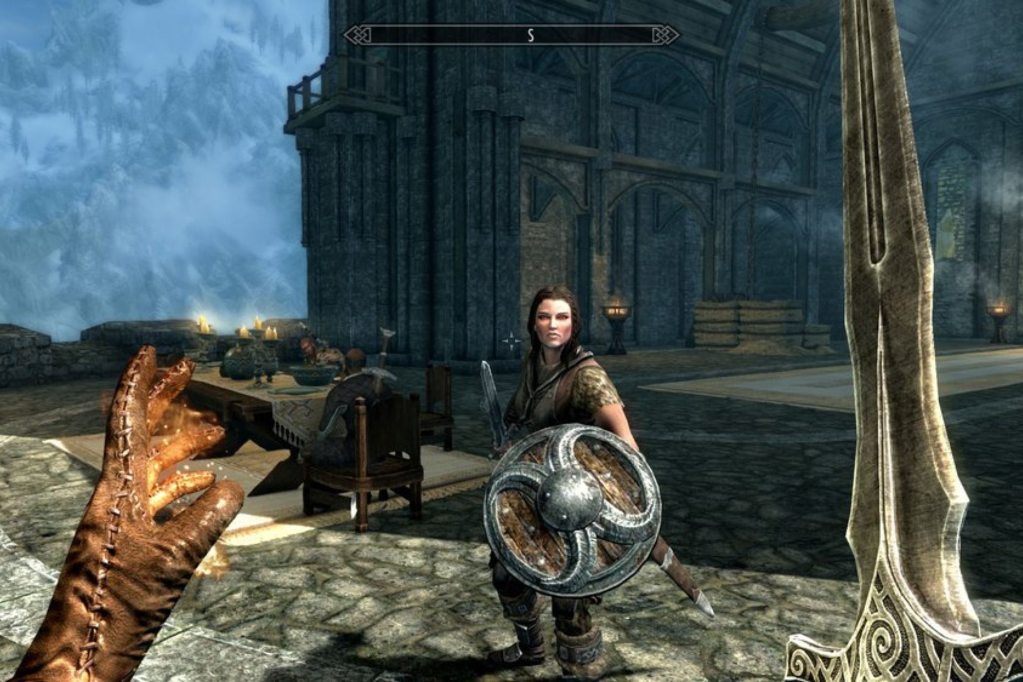 Skyrim player fighting NPC with sword