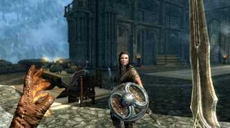 Skyrim player fighting NPC with sword