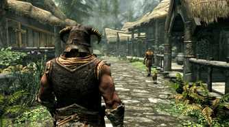 Skyrim player walking through starting town