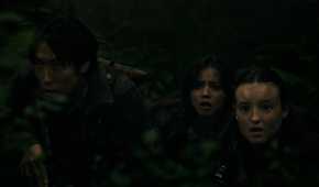Jesse, Dina, and Ellie looking afraid while hiding in HBO's The Last of Us, season 2, episode 5.