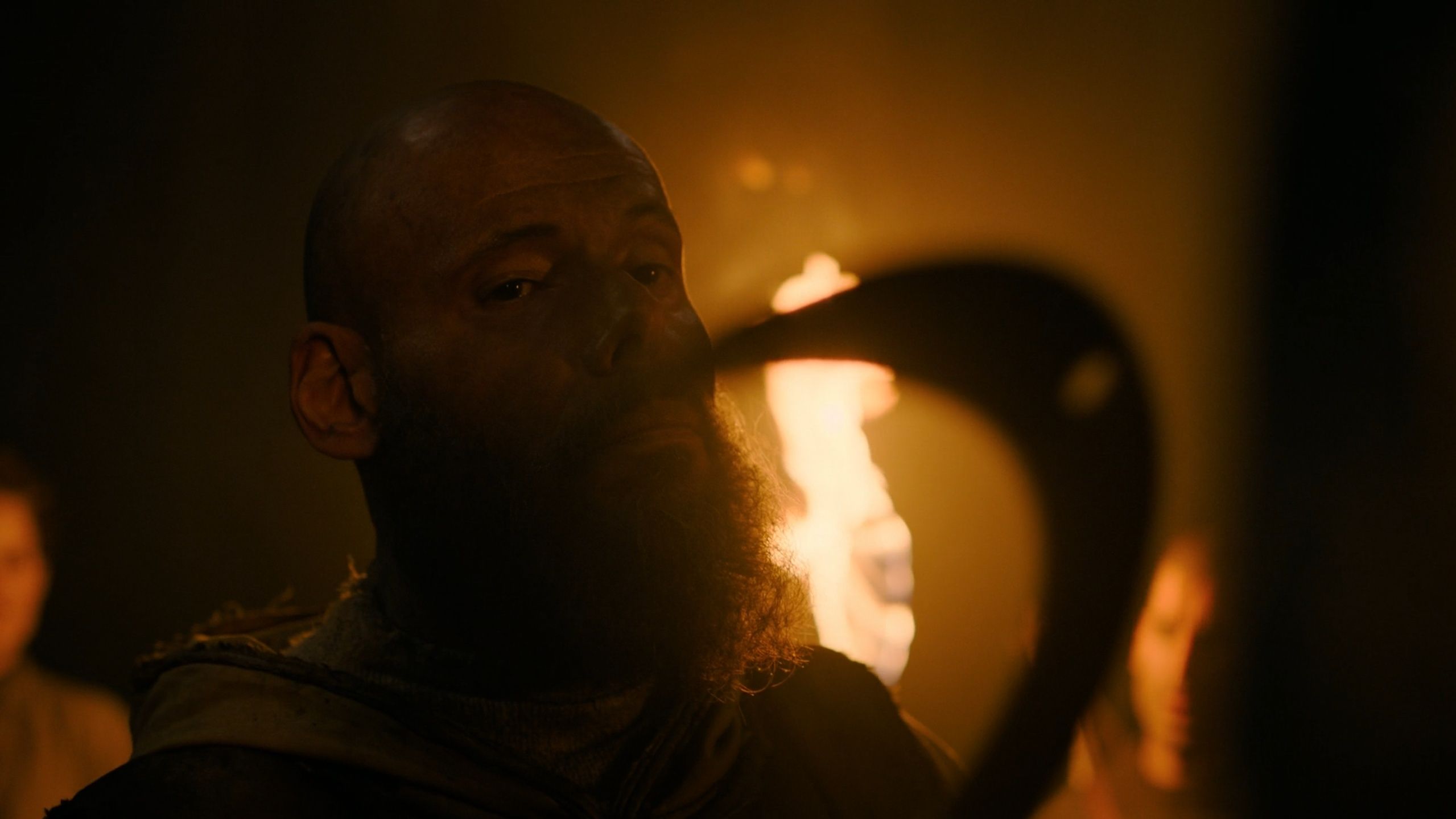 A Seraphite holding a sickle in HBO's The Last of Us, season 2, episode 5.