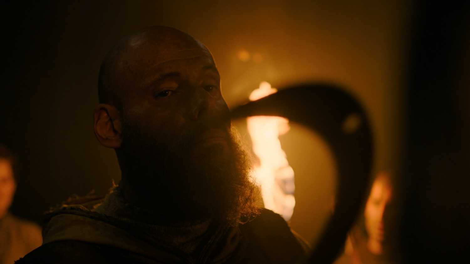 A Seraphite holding a sickle in HBO's The Last of Us, season 2, episode 5.