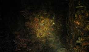 A zombie stuck to the wall, surrounded by fungus, in HBO's The Last of Us, season 2, episode 5.