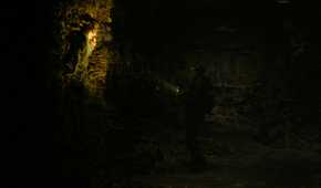 A zombie breathing spores at Ellie in HBO's The Last of Us, season 2, episode 5.