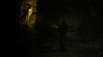 A zombie breathing spores at Ellie in HBO's The Last of Us, season 2, episode 5.