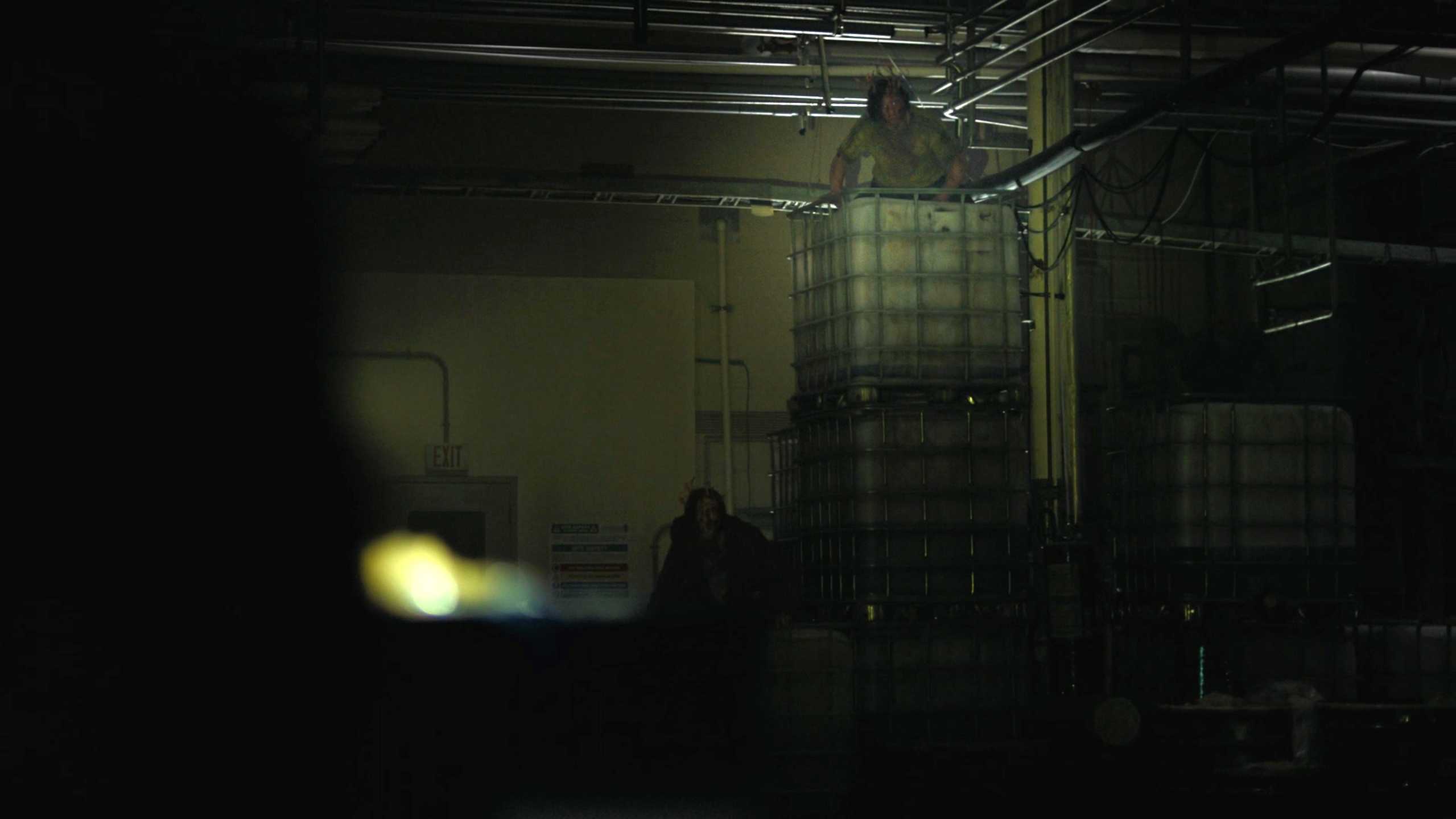 Stalkers visible in flashlight in HBO's The Last of Us, season 2, episode 5.
