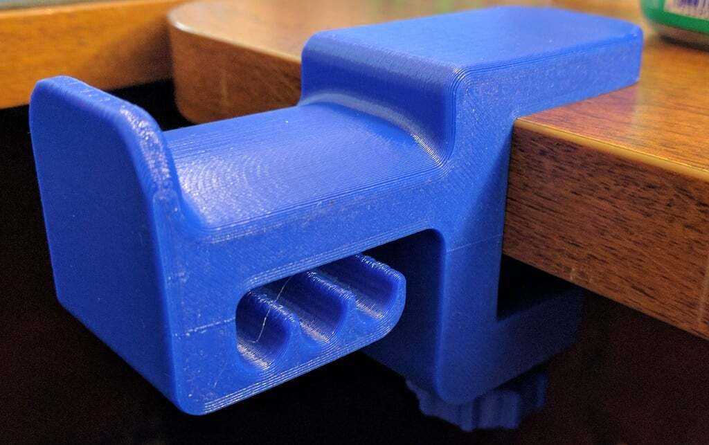 3D printed blue headphone hanger