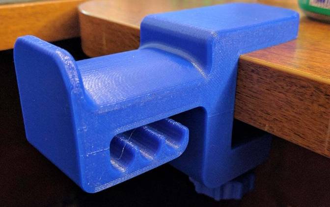 3D printed blue headphone hanger