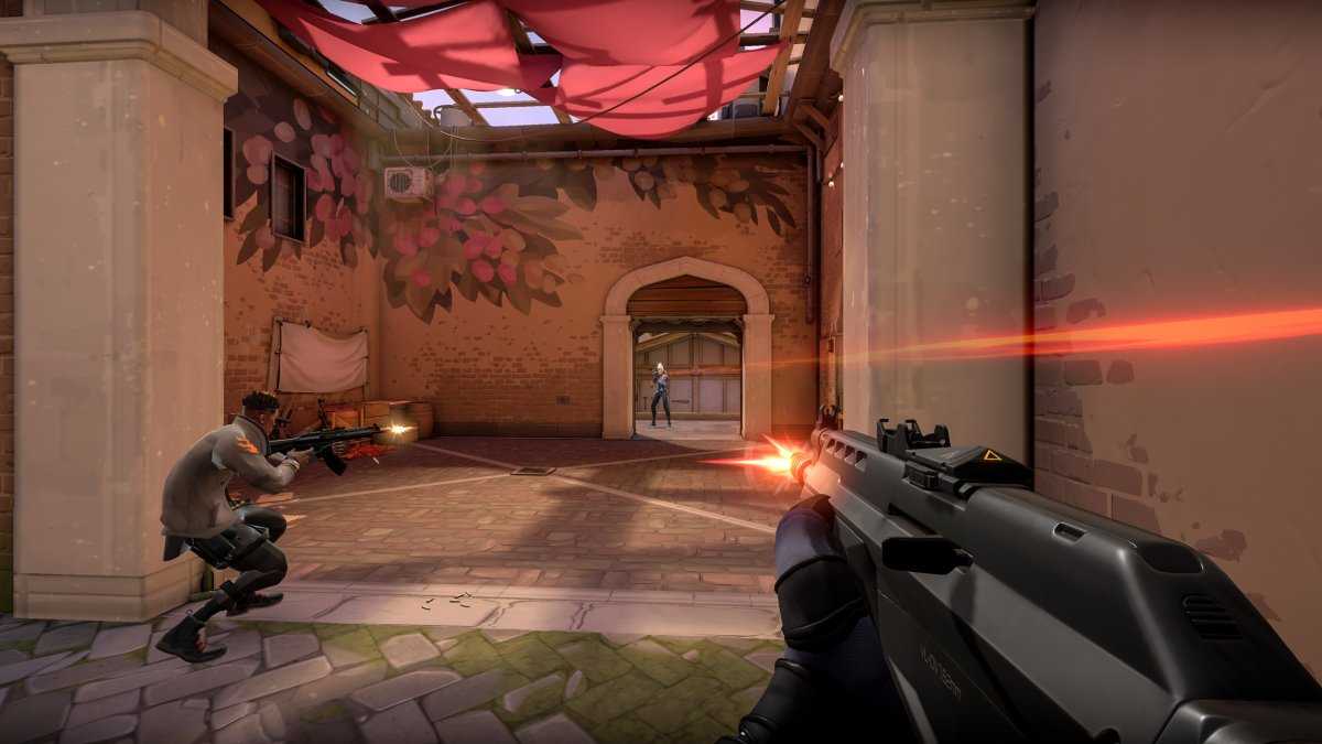 valorant gameplay with a shooter approaching in a hallway