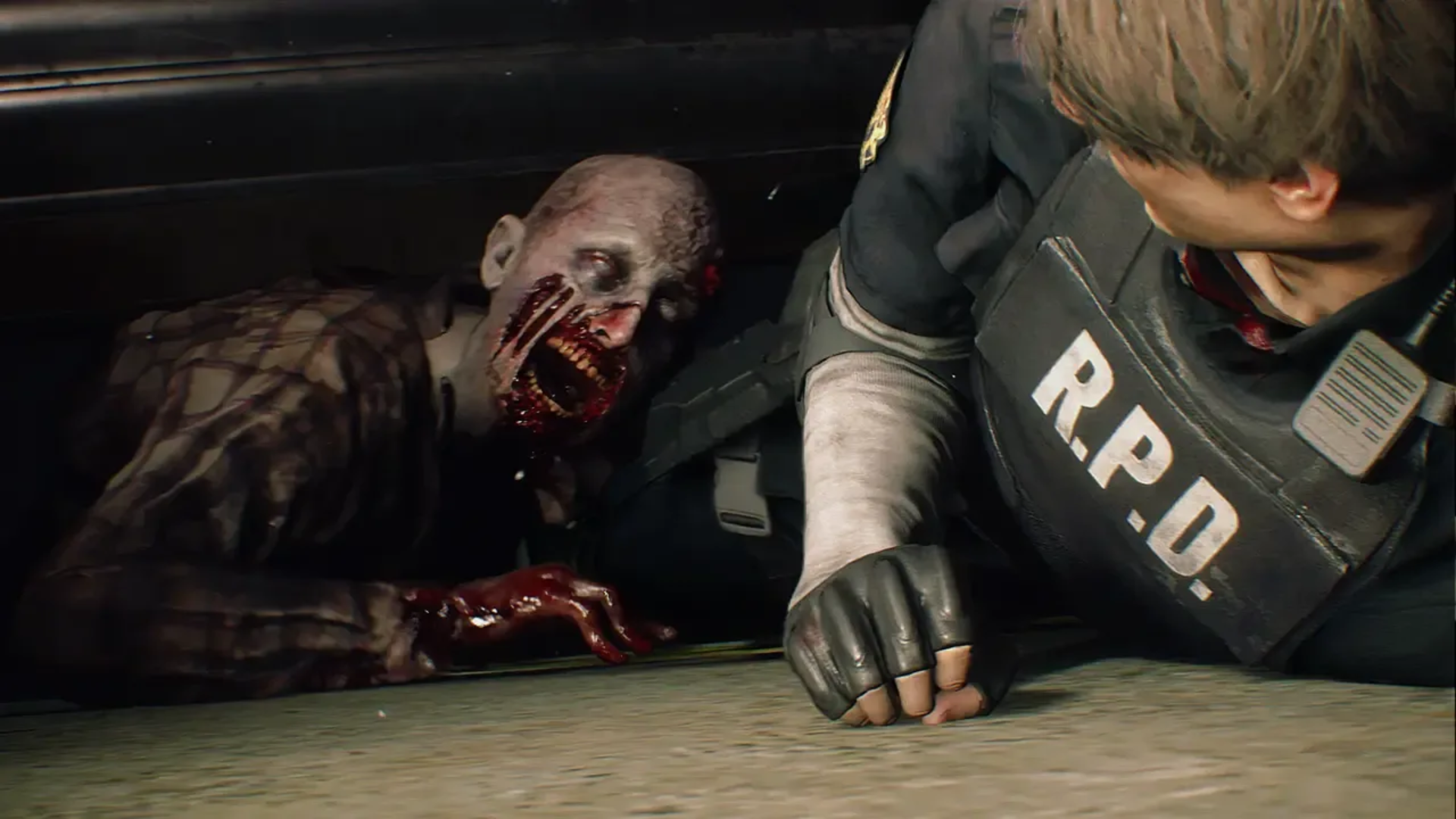A zombie attacking Leon in Resident Evil 2 Remastered