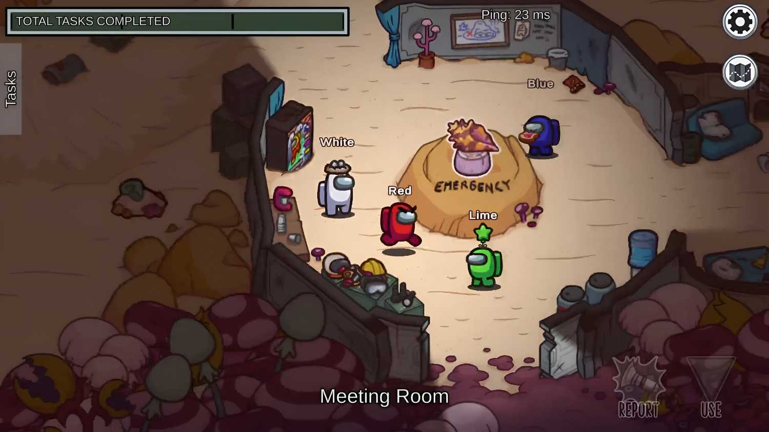 Four players in the meeting room in Among Us.