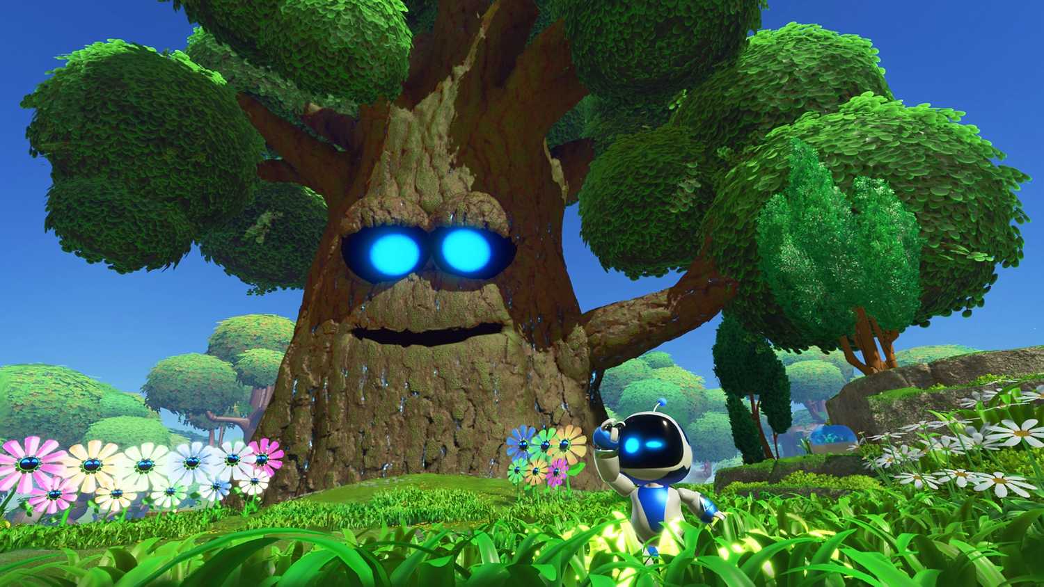 Astro standing next to a sentient tree in a grassy meadow in Astro Bot.
