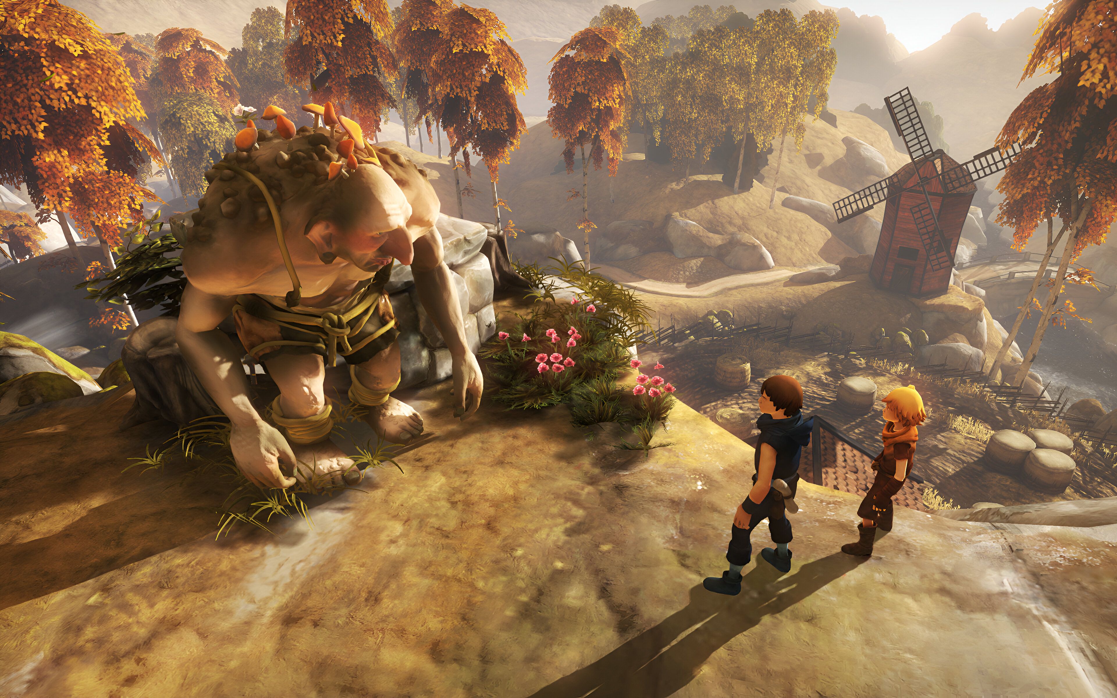 Two brothers talking to a troll in Brothers: A Tale of Two Sons.