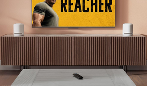 Amazon Fire TV Stick 4K on living room with TV on