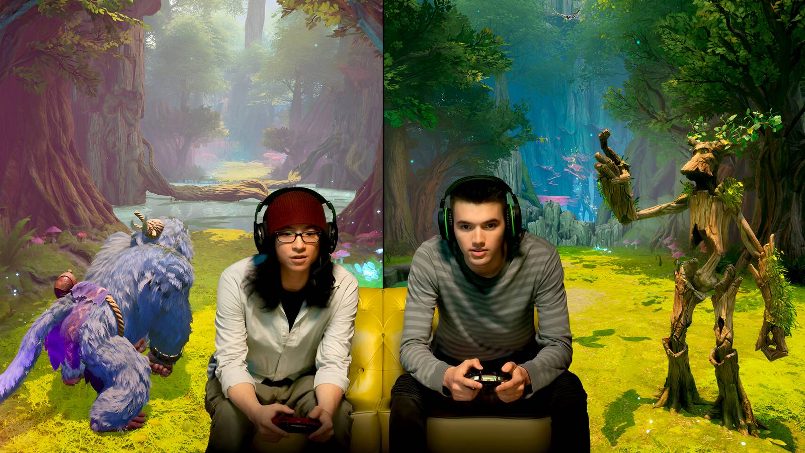 Two people gaming while sitting on a sofa while Split Fiction plays in the background.