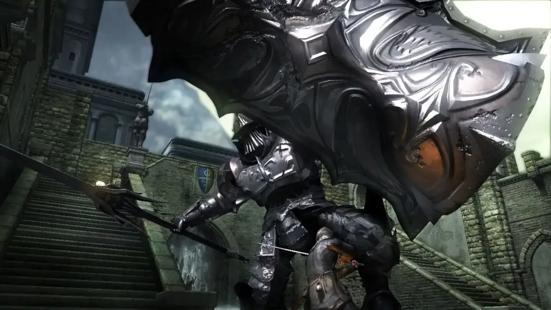 Fighting a gaint knight in Demon's Souls